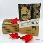 Paperback copies of Outdoor Reflections for Deer Hunters by Harold E. Kohn with autumn leaves